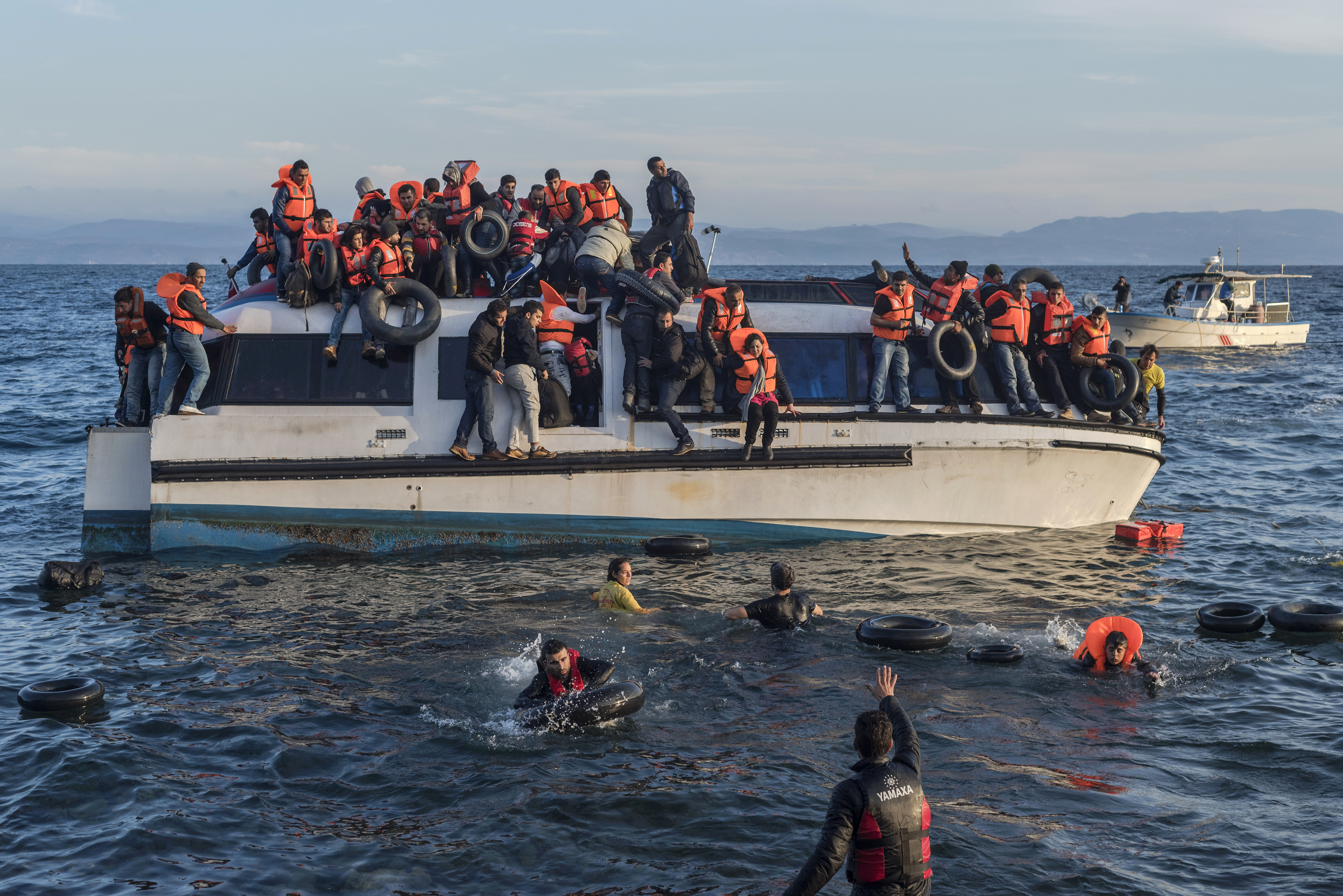 Sinking boat migrants